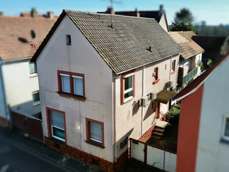 Kapitalanlage mit Potenzial: vielseitiges MFH mit drei Wohneinheiten in Herxheim
